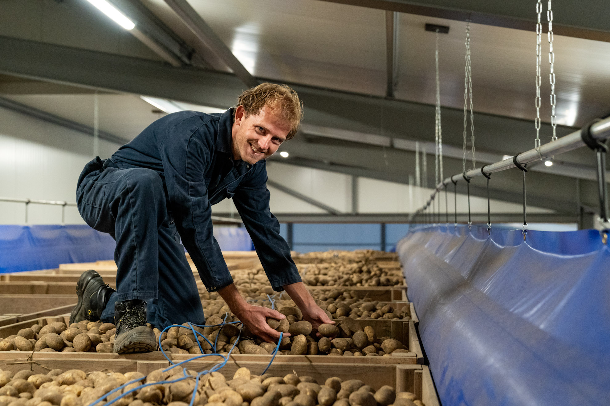 Arable farming student among the potatoes