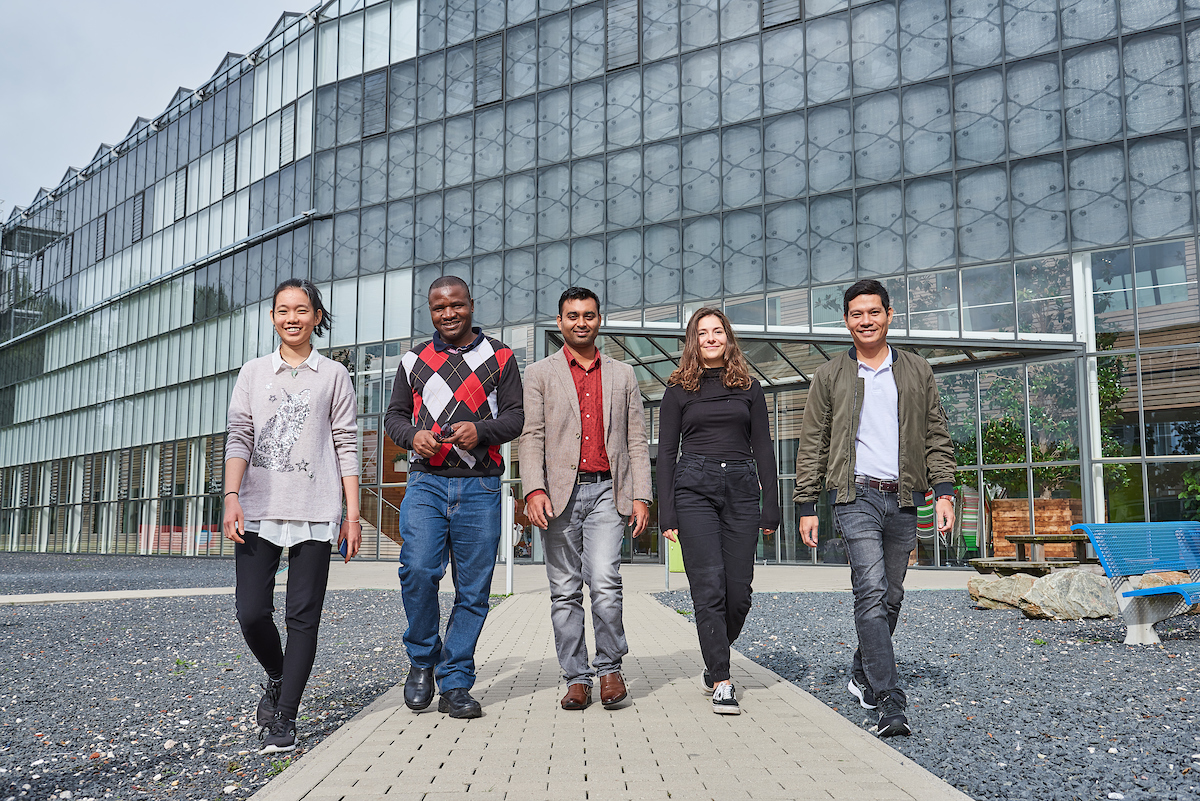 Students walking outside university building