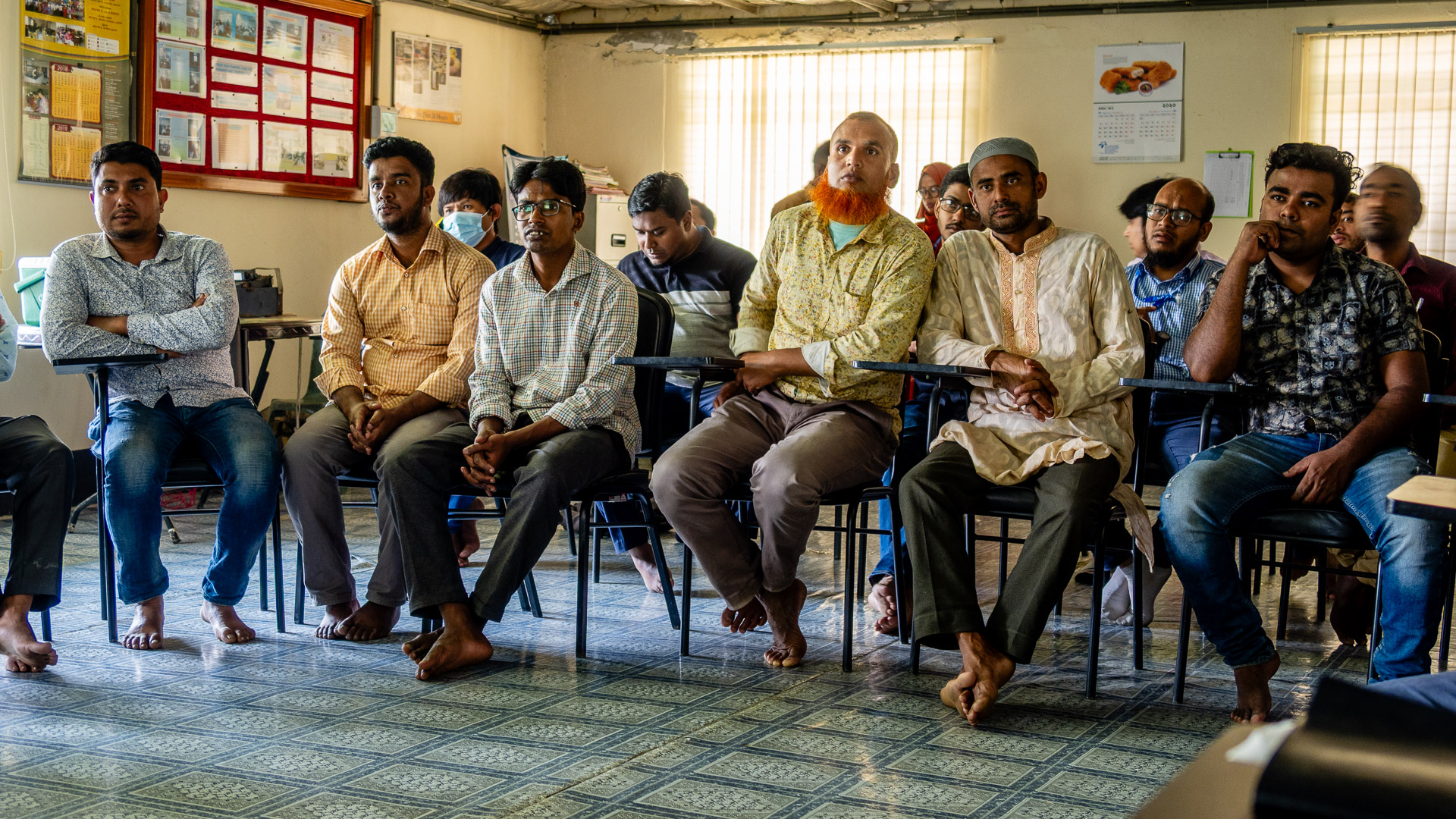 Poultry managers and farmers in classroom in Bangladesh