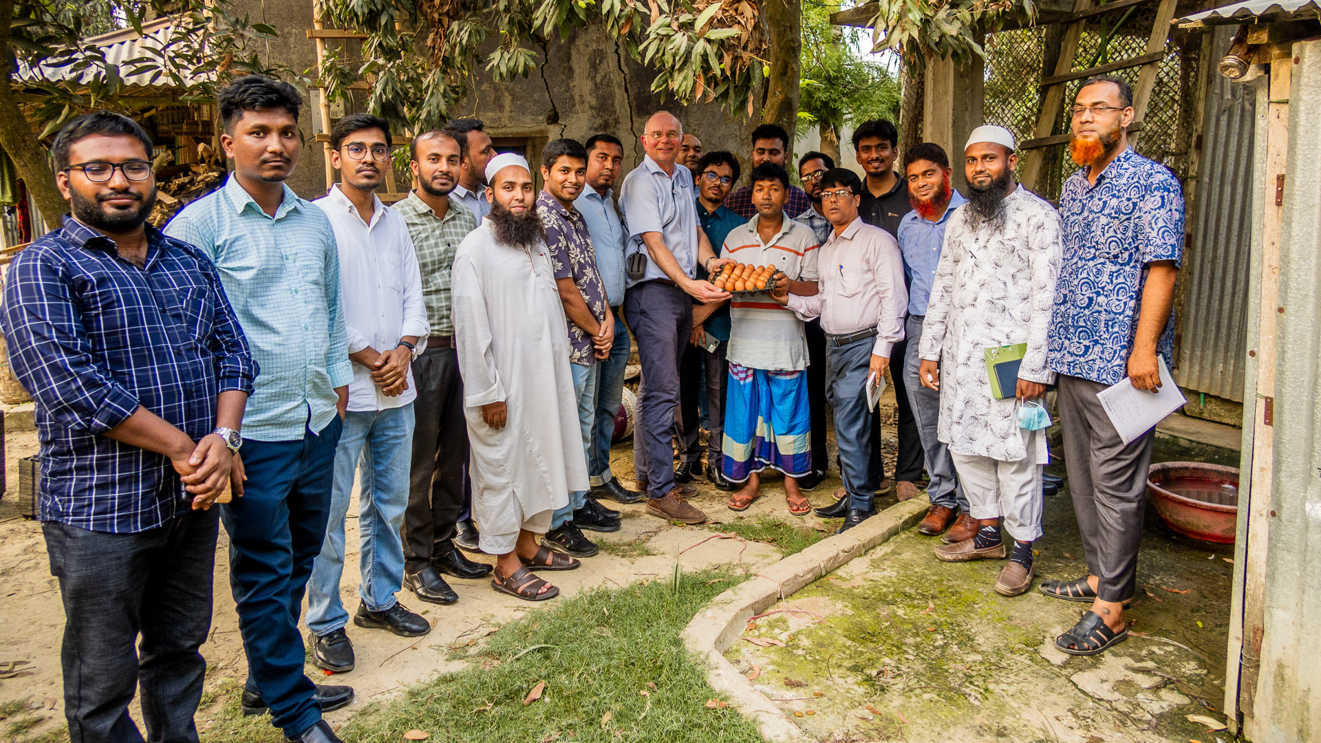 Poultry managers and farmers with teachers in Bangladesh