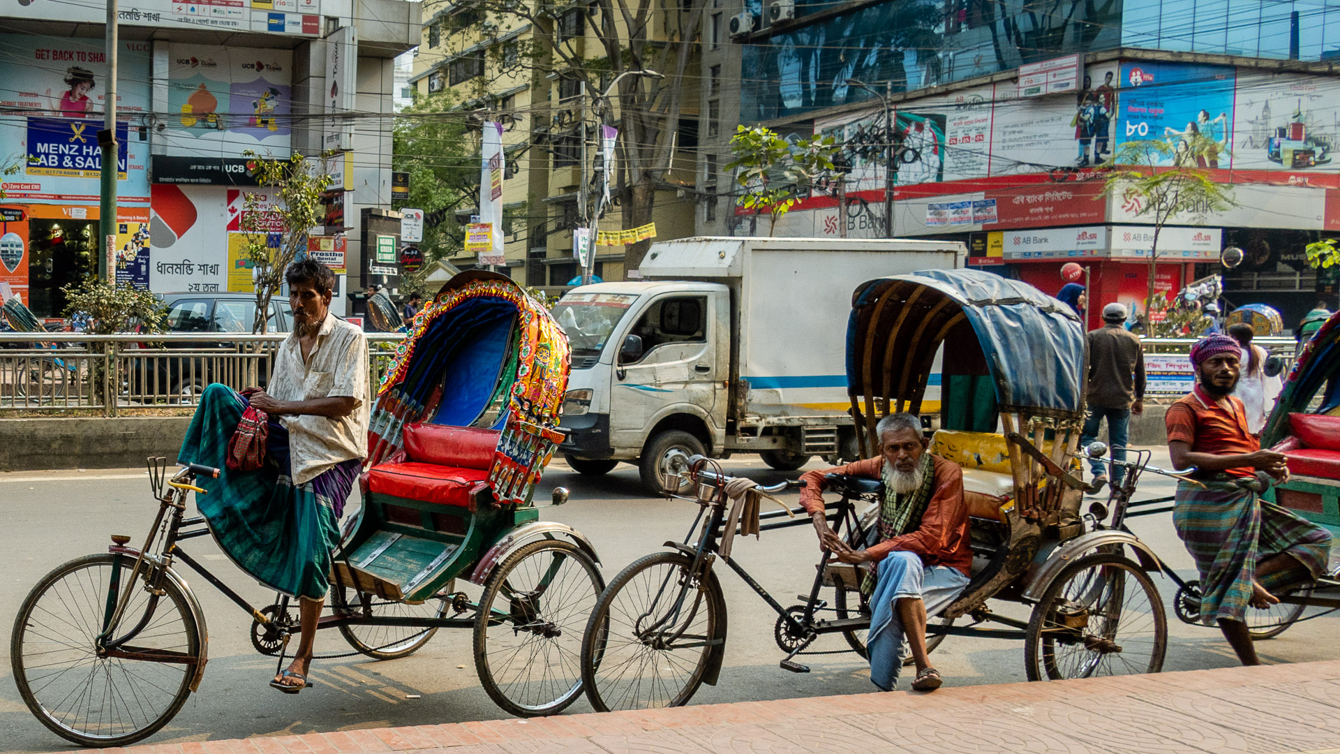 Riksjas in traffic in Bangladesh